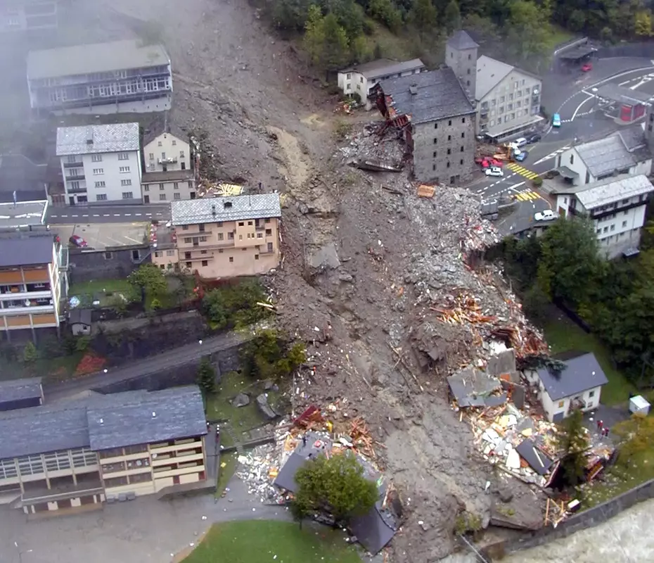 Aerial view of a town severely damaged by storms in Valais and Ticino, Switzerland, supported by Swiss Solidarity’s 2000 relief campaign.