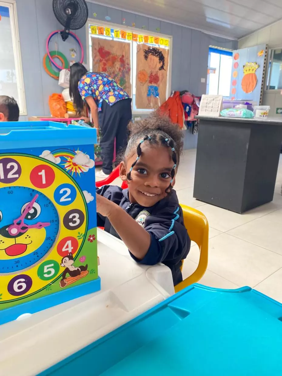 Thanks to your donations this little girl can go to kindergarten and learn how to tell time. 
