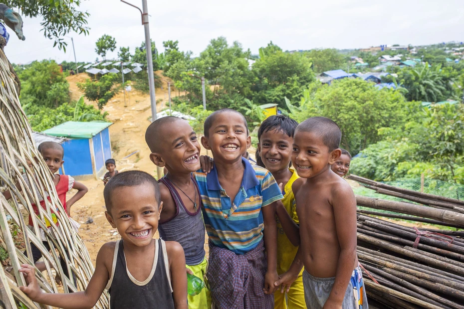 Smiling children benefit from children's aid and education - your donations change lives and give hope.
