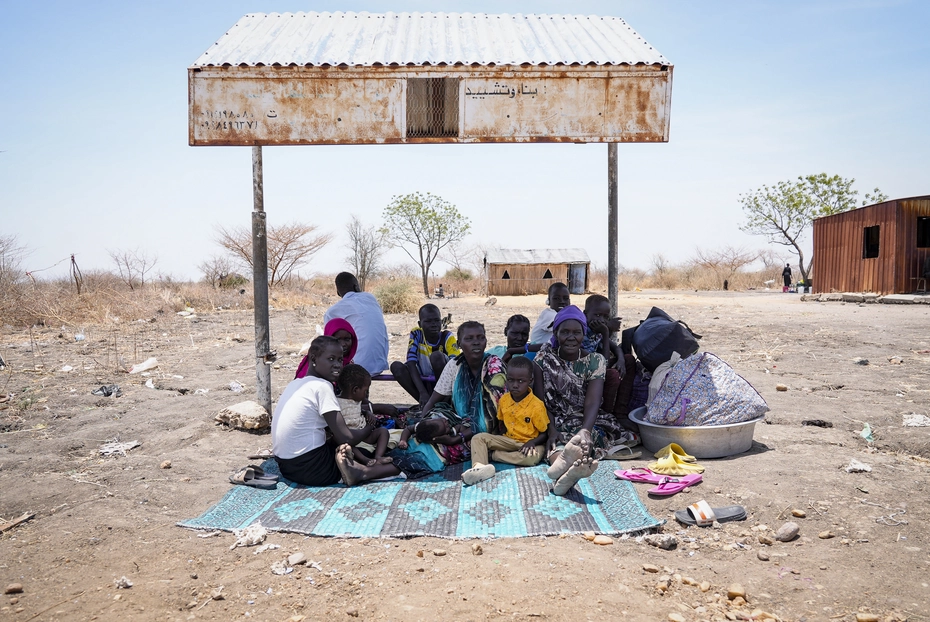 South Sudanese returnees fleeing war in Sudan wait in Renk - in need of emergency aid and humanitarian support.