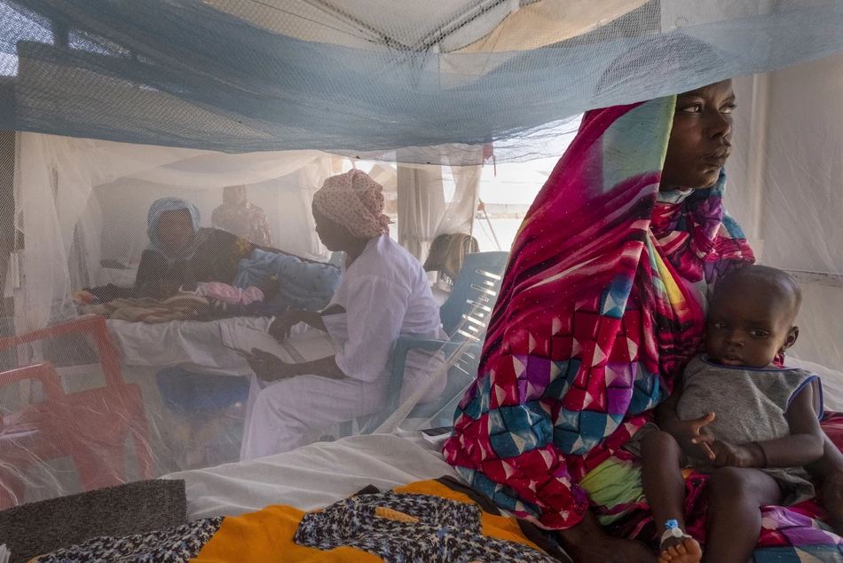 Malnourished Sudanese children treated by MSF in Chad - donations save lives.